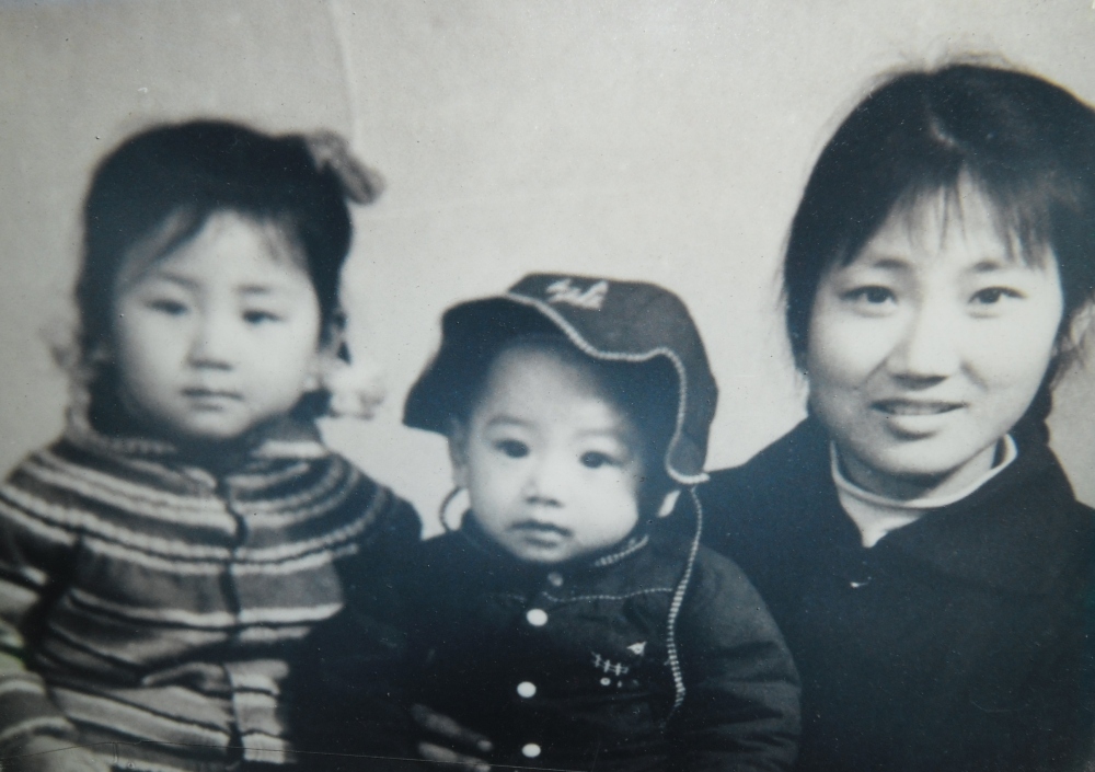 In 1968 China's birth rate was slowly beginning to increase, average family size was 3.5 and depite Maoist propaganda to increase equality of the sexes, with hierachical Confusionist values emphasising women's low status still common, wives were left to manage the family. Pictured here in her favourite hat and coat with her house-wife mother and one of her three older sisters- how would this two year old leave her footprint on the earth?